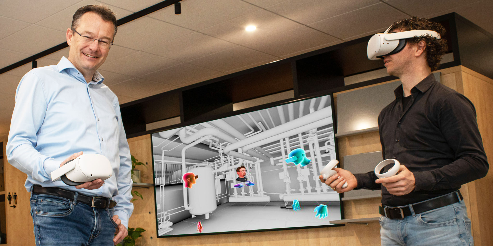 Rene´-Evers-en-Tjerk-Boorsma-in-het-model-vanuit-Kantoor-Dura-Vermeer-Bouw-Hengelo Multivirtuele beleving brengt samenwerken in BIM nog meer tot leven